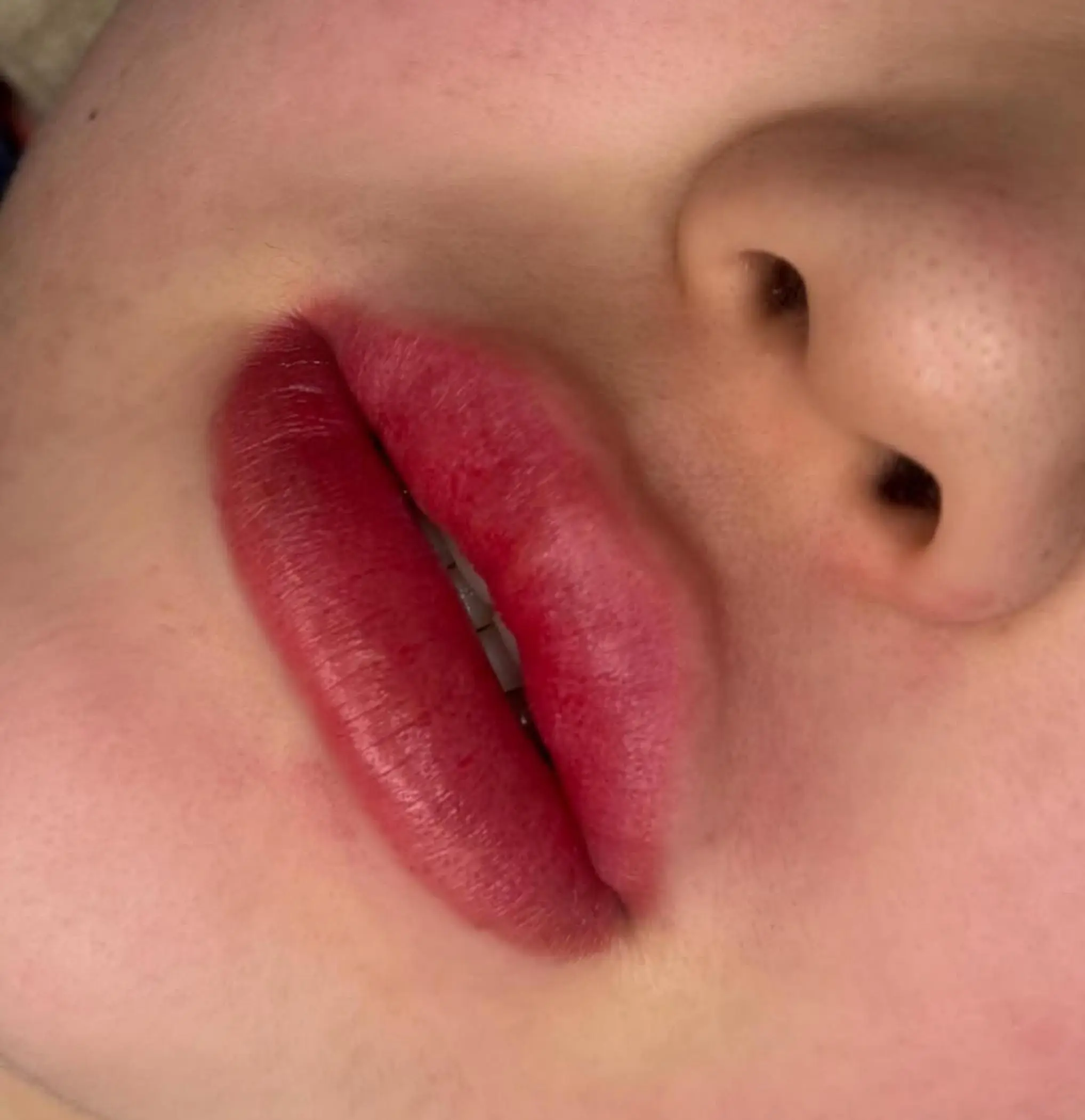 trained artist working on microblading correction